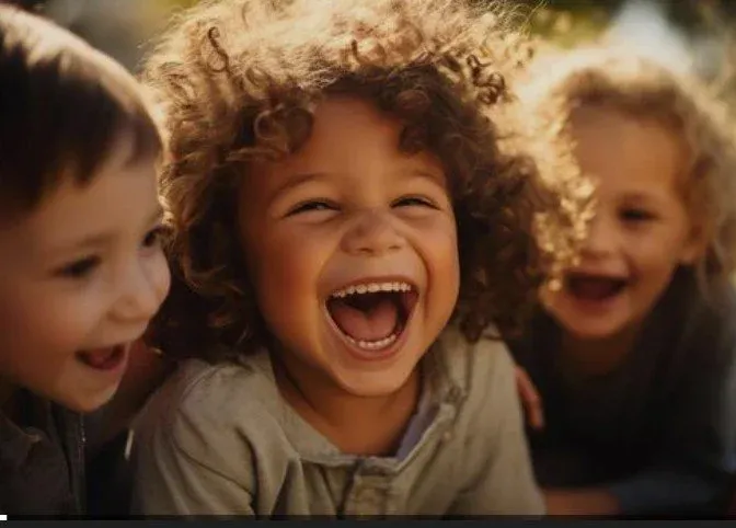 Young children laughing together