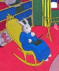 Illustration of a white rabbit in a blue robe sitting in a rocking chair