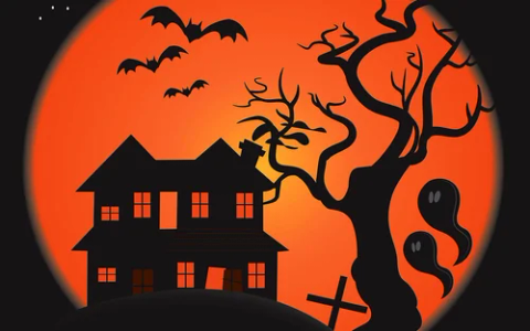 Haunted house and bare tree silhouetted against a huge orange moon, with bats